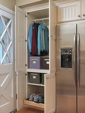 Handy "closet" cabinet near the back door leading into a kitchen with no mud room.  Brilliant! Backdoor Entry Into Kitchen, Entry Into Kitchen, Kitch Cabinet, Mudroom Nook, Backdoor Entry, Custom Closet Cabinets, Coat Cabinet, Custom Cabinets Kitchen, Kitchen Mudroom