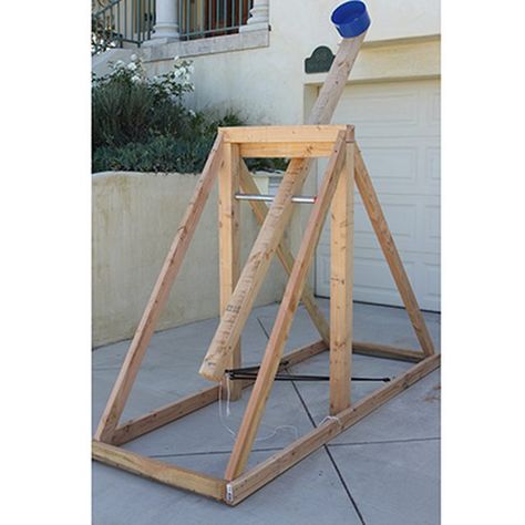 This pumpkin launcher will provide hours of messy entertainment for everyone. Pumpkin Launcher, Pumpkin Catapult, Build A Catapult, Pumpkin Chunkin, Catapult Project, Holiday Science, Harvest Fest, Girl Scout Crafts, Outdoor Diy Projects