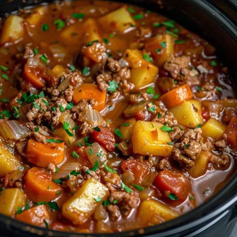 Slow Cooker Poor Man's Stew is a testament to the ingenuity of home cooking, crafted from humble beginnings. This stew, rooted in the resourcefulness of families using simple and affordable ingredients, offers a comforting and heartwarming experience. It's a dish that brings a sense of nostalgia and respect for the creativity in the kitchen during times when resources were limited. With its rich flavors and budget-friendly ingredients, this stew remains a cherished staple in many homes. It's a w Hearty Crockpot Soups, Poor Mans Stew, Slow Cooker Soup Recipes, Garlic Chicken Stir Fry, Beef Casseroles, Hamburger Stew, Crockpot Stew, Beef Dinners, Mince Recipes