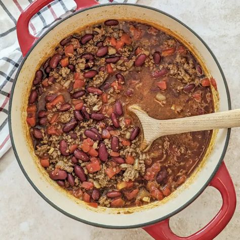 Dutch Oven Chili 12 Dutch Oven Chili And Cornbread, Best Beans For Chili, Dutch Oven Chili, Dutch Oven Soup, Chili And Cornbread, Ancho Chili Powder, Oven Recipe, Brittle Recipes, Best Chili Recipe