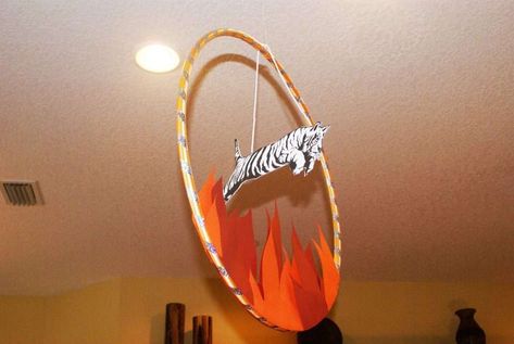 Lion Jumping Through Hoop, Diy Ring Of Fire Hula Hoop, Circus Ball, Circus Birthday Party Ideas, Tiger Party, Circus 1st Birthdays, Circus Birthday Party Theme, Halloween Circus, Circus Decorations