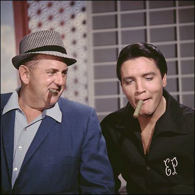 Ramblings of a Lifelong Elvis Fan – Part 62 – Elvis and Colonel Tom Parker A little over 60 years ago, in August of 1955, Elvis signed a contract with manager, Colonel Tom Parker. The Colonel negotiated a deal with RCA for Elvis’ Sun contract for an unprecedented $40,000, $5,000 of which was a bonus for back royalties owed by Sun Records . Read more: http://aliciadean.com/2015/09/18/ramblings-of-a-lifelong-elvis-fan-part-62-elvis-and-colonel-tom-parker/ Colonel Tom Parker, Elvis Presley Family, Tom Parker, Ginger Beard, Elvis Presley Pictures, Elvis And Priscilla, Roy Orbison, Jerry Lewis, Elvis Presley Photos