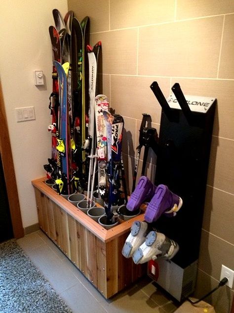 Although i have never used skis, This Ski Rack and boot dryer would work perfectly for the 12 golf clubs 4 baseball bats and walking stick I have by the door... oh and the 7 pair of boots that I'm constantly having to shuffle around lolz: Ski Mud Room, Snowboard Storage, Ski House Decor, Garage Organization Ideas, Gear Room, Ski Room, Ski Rack, Ski Cabin, Boot Storage