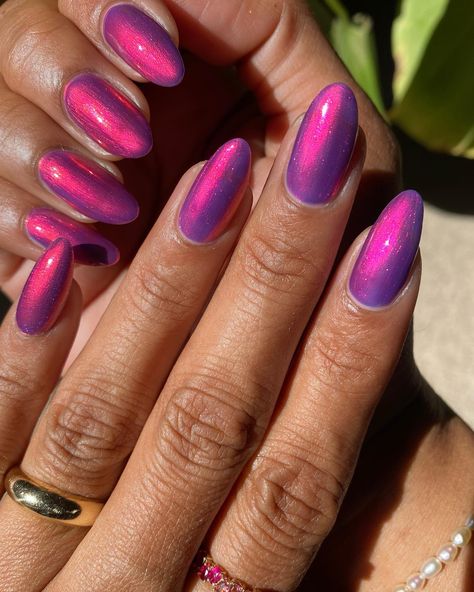 Posted by Zoe Scott: Welcome to my world of color and creativity, where today we're diving into the charming realm of pink and purple nails! If you're anything like me, yo... Gel Nails Holographic, Fuschia Purple Nails, Taylor Swift Chrome Nails, Pink And Purple Cat Eye Nails, Vibrant Purple Nails, Purple Pink Chrome Nails, Majenta Color Nail Art, Purple And Pink Nails Ideas, Pink Purple Nail Designs