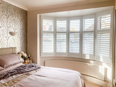 White Wood Shutters are the perfect dressing for bay windows and bedroom spaces, adding light and sound coverage with the simple tilt of the slats. Shutters On Bay Window, Wooden Shutter Blinds, White Shutter Blinds, Shutters With Curtains, Bay Window Blinds, Bay Window Shutters, Wooden Window Blinds, White Shutters, Interior Design London