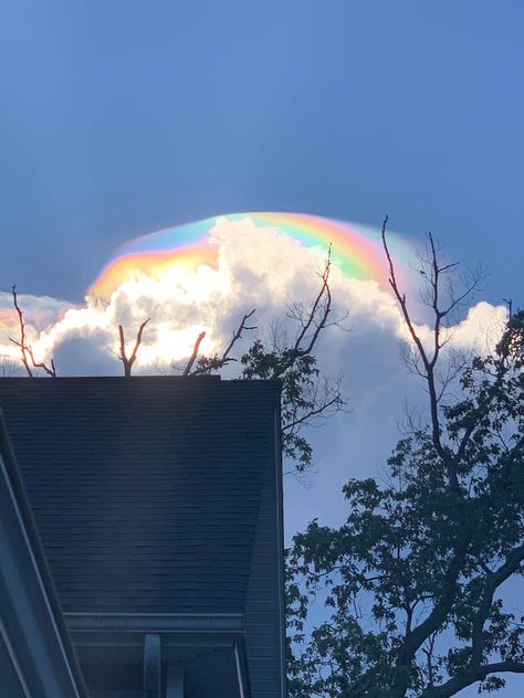 Iridescent cloud  This is a pileup cloud. Ice crystals form above the top of the primary storm. These crystals refract the sunlight when the angle is just right, and give off that glowing rainbow appearance. Moon Rainbow, The Angle, Sky Moon, Ice Crystals, Clouds Design, Natural Phenomena, Beautiful Sky, Cloud Gate, Night Skies