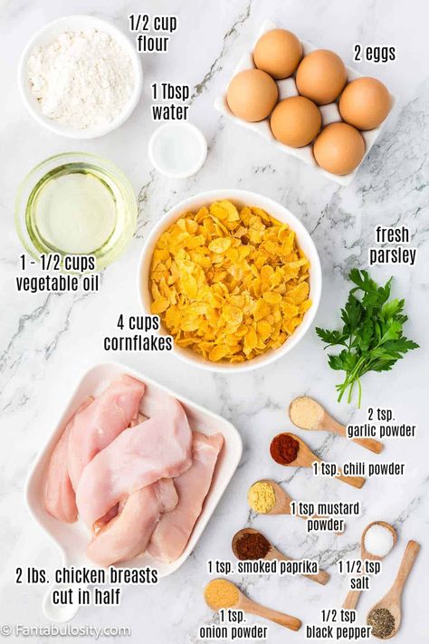 This easy cornflake chicken recipe uses corn flakes and is cooked on the stove! Such a delicious dinner recipe. Chicken Tenders With Corn Flakes, Corn Flake Crusted Chicken, Corn Flakes Chicken Tenders, Chicken Corn Flakes Recipes, Chicken Cornflakes Recipes, Chicken With Corn Flakes Baked, Recipes Using Corn Flakes, Fried Chicken With Corn Flakes, Corn Flake Recipes