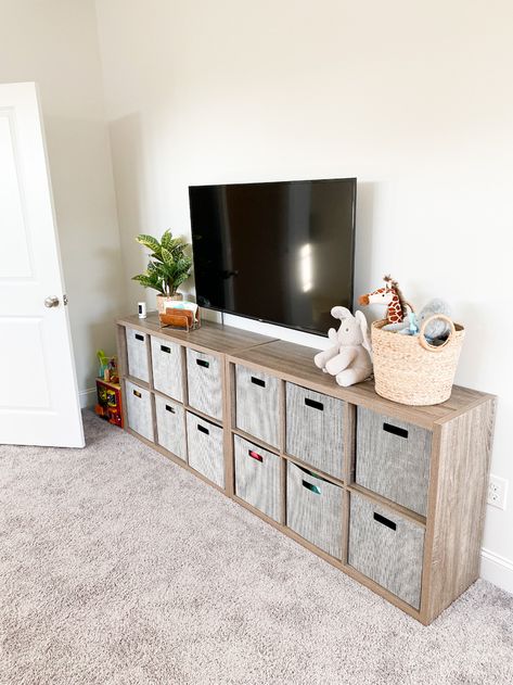 Cube Storage Tv Stand Playroom, Living Room Under Tv Storage, Toy Room Storage Shelves, Playroom Cubby Storage, Tv Stand Toy Storage Ideas, Tv Unit Toy Storage, Cube Storage Tv Stand Living Room, Playroom Cube Organizer, Living Room Toy Storage Under Tv