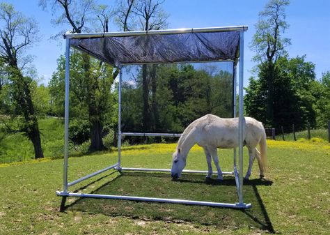 Ample shade for horse and cattle is crucial. Portable horse and livestock shade structures from Klene Pipe are easy to assemble & made to last Shade For Horses, Horse Hay Feeders, Horse Barn Organization, Horse Trailer Organization, Horse Shelters, Hay Feeder For Horses, Horse Hacks, Horse Paddock, Horse Farm Ideas