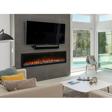 The Modern Flames 60-in Spectrum Slimline Built-In Electric Fireplace is a new offering that can be recessed within 2" x 4" walls or hung directly on the wall - making the Spectrum series incredibly versatile. With its sleek 5/8" trim, rather than a wide glass frame, the Spectrum fireplace maximizes the overall viewing area of the beautiful LED lit flame effects. The flames are a new technology, Hybrid-FX which create a wonderful ambiance with 12 different color options that complement either th Modern Fireplace Mantles, Wall Mounted Electric Fireplace, Mounted Electric Fireplace, Tv Over Fireplace, Electric Fireplace Wall, Recessed Electric Fireplace, Tv Fal, Built In Electric Fireplace, Modern Flames