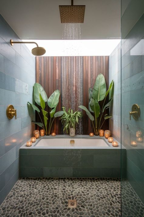 Outdoor tropical bathroom with waterfall shower, candlelight, and natural elements. Waterfall Shower Bathroom, Candlelit Bath, Tropical Showers, Tropical Bathroom, Outdoor Bathroom, Waterfall Shower, Shower Bathroom, Tropical Oasis, Rustic Retreat