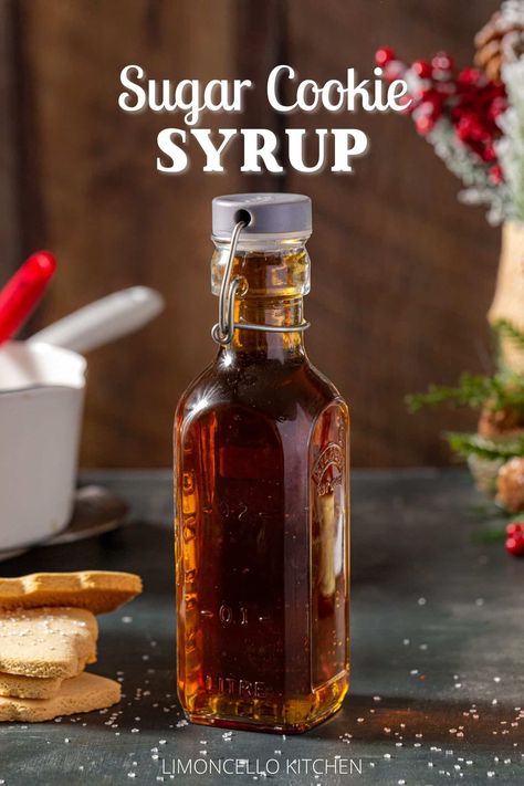 This easy to make Sugar Cookie Syrup tastes just like sugar cookies! It's great for sweet cocktails, lattes and even drizzled on pancakes. Easy to make at home with just 4 ingredients! Vanilla and almond go perfectly together to give this syrup its warm and cozy flavor. It's the perfect syrup to make for Christmas and the winter holiday season. Sugar Cookie Syrup, Caramel Cocktail, Coffee Bar Party, Homemade Coffee Syrup, Syrup Labels, Almond Milk Latte, Simple Syrup Cocktails, Flavored Water Recipes, Homemade Sugar Cookies