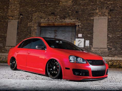 Check out Derick Szyda's 2006 Volkswagen Jetta GLI with its Awe Tuning S3 K04 turbo kit, AirLift Slam XL kit, Jl Audio amps, DSG transmission, and more! - Eurotuner Magazine Vw Bora Tuning, Jetta A4, Volkswagen Phaeton, Vw Fox, Jetta Mk5, Vw Eos, Vw Group, Volkswagen Car, Vw T6