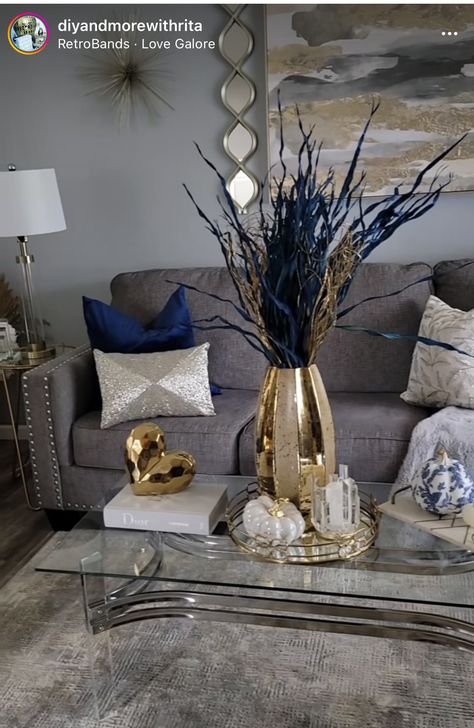 Navy Blue Grey Gold Living Room, Blue Cream Living Room Ideas, Gray Blue And Gold Living Room, Blue And Gold Apartment Decor, Gray Accent Wall Living Room, Gray And Taupe Living Room, Black Sofa Decor, Cream Living Room Decor, Blue And Cream Living Room