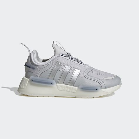 These juniors' adidas NMD_V3 Shoes are a versatile and fresh take on the iconic sneaker. The upper has a sleek, sock-like fit that's easy to pair with any outfit. A energy-returning BOOST midsole helps you stay comfortable all day long. This shoe's upper is made with a high-performance yarn which contains at least 50% Parley Ocean Plastic — reimagined plastic waste, intercepted on remote islands, beaches, coastal communities and shorelines, preventing it from polluting our ocean. The other 50% o Adidas Nmd V3, Adidas Shoes Nmd, Nmd Adidas, Adidas Originals Nmd, Adidas Original, Adidas Nmd R1, Shoes Grey, Nmd R1, Adidas Shop