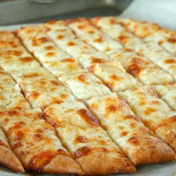 Cheesy Garlic Bread Sticks - Lauren's Latest Cheesy Garlic Bread Sticks, Garlic Bread Sticks, Cheesy Garlic Breadsticks Recipe, Garlic Breadsticks Recipe, Cheese Bread Sticks, Best Pizza Dough Recipe, Garlic Pizza, Bread Sticks Recipe, Garlic Breadsticks