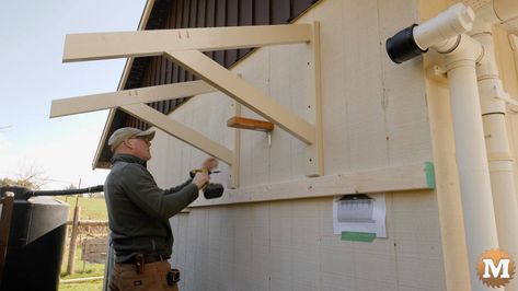 Build a wall mounted awning frame from wood with a steel roof attached to the side wall of a workshop. This is an easy DIY woodworking project. Diy Wood Awning, Diy Awnings, Diy Window Awning, Porch Awnings Exterior, Shed Awning Ideas, Outdoor Window Awnings, Awning Over Door, Porch Awning, Diy Awning