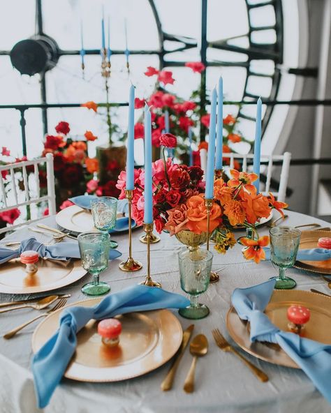 Red Orange Pink Blue Wedding, Maximalist Wedding Table Decor, Vibrant Wedding Table Decor, Blue Wedding Colour Scheme, Red Orange Blue Wedding, Event Color Schemes, Unique Floral Centerpieces, Blue And Orange Table Setting, Unique Fall Wedding Colors