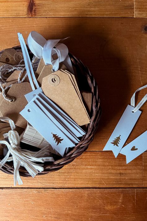 One of my favorite Christmas wrapping ideas to get a jump on the holidays is to set up a gift-wrapping station in your home that is well stocked BEFORE the gift-giving games begin. So grab a cute, vintage basket and fill it with a variety of gift tags that are neutral enough to top any gift. Visit the blog for more gift-wrapping tips along with a guide to gift-wrapping essentials. Christmas Wrapping Station Ideas, Wrapping Station Ideas, Christmas Picture Books, Wrapping Tips, Christmas Wrapping Ideas, Gift Wrapping Station, Wrapping Paper Storage, Wrapping Station, Amazon Box