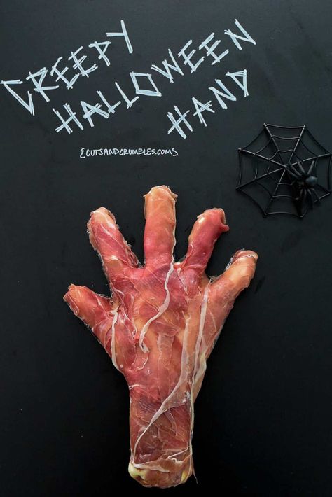 Creepy Halloween Hand Recipe--A flavored cream cheese dip shaped into a creepy hand and wrapped in prosciutto to make a disturbingly realistic Halloween appetizer! Freak out your party guests with this simple, tasty, totally edible (if you can stomach it) eerie snack! {cutsandcrumbles.com} #Halloween #creepy #weirdfood #Halloweenappetizer #Halloweenparty #festivefood #prosciutto #appetizer #creamcheesedip #makeaheadappetizer #partyfood #nocookappetizer #cutsandcrumbles Flavored Cream Cheese, Halloween Appetizer, Creepy Food, Smoked Mac And Cheese, Creepy Halloween Food, Creepy Hand, Cream Cheese Dip, No Cook Appetizers, Spooky Food