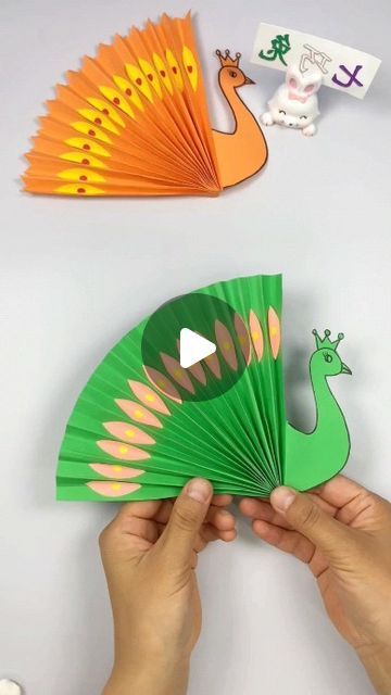 paper crafts creator on Instagram: ""Create a Stunning Paper Peacock with Your Children: Step-by-Step Guide"  ### Hashtags: #ParentChildCraft #HandmadeDIY #PeacockOrigami #PaperPeacock #OrigamiPeacock #FamilyCraftTime #DIYProjects #CraftingWithKids #ArtAndCrafts #CreativeParenting" Paper Peacock Crafts, Peacock Feather Craft, Peacock Crafts For Kids, Peacock Paper Craft, Paper Peacock, Peacock Crafts, Stem Projects For Kids, School Decoration, Peacock Decor