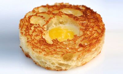 This easy toad-in-a-hole recipe with brioche, black truffle butter, and quail eggs will make 15 toasts; serve 2-3 per person as an hors d'oeuvre. Quail Egg Recipes, Truffle Butter Recipe, Black Truffle Butter, Canapes Recipes, Avocado Toast Egg, Truffle Butter, Easter Brunch Food, Brunch Buffet, Egg Toast