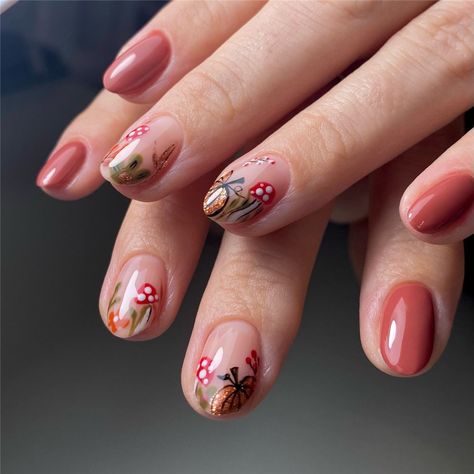 60+ Fall Nails and Fall Nail Colors You Have To Try in 2024 Cute Nails Autumn, Autumn Mushroom Nails, Fall Nails Mushroom, Autumn Nail Art Ideas, Toadstool Nail Art, Mushroom Fall Nails, Whimsical Nail Designs, Mushroom Nail Art Designs, Red Mushroom Nails