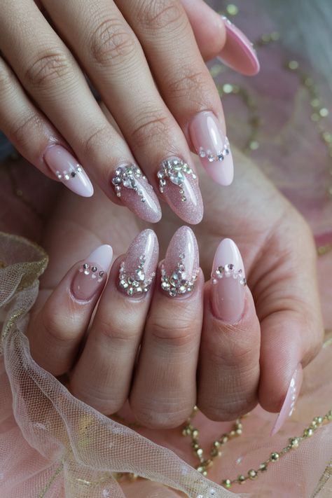 Embrace the charm of stunning pink nails with this chic almond-shaped gel style. The soft pink hue beautifully highlights the nail extensions, while a touch of high gloss finish creates an elegant shine. Accentuate your look with delicate rhinestones that add a hint of sparkle, making your nails the perfect accessory. Whether for a special occasion or every day, these pink nails exude femininity and flair. #PinkNails #NailArt #GelNails #Rhinestones #NailExtensions #ChicNails Pink Nails Ideas, Spring Florals, Seasonal Nails, New Nail, Almond Shaped, Styling Gel, Nail Inspiration, Nail Extensions, Chic Nails