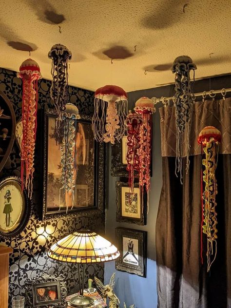 Whimsigoth Small Room, Posable Skeleton Ideas Inside, Crochet Jellyfish Room Decor, Diy Eclectic Wall Decor, Whimsical Ocean Bedroom, Ceiling Craft Ideas, Maximalist Ocean Decor, Pirate Core Aesthetic Bedroom, Chill Room Aesthetic Vintage