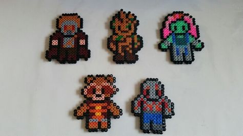 Guardians of the Galaxy perler beads. Starlord, Groot, Gamora, Rocker, Drax. Perler Necklaces, Hammer Beads, Beads Perler, Perler Designs, Grid Art, Hamma Beads Ideas, Pixel Beads, Hamma Beads, Perler Art