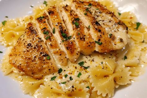 Lemon Garlic Chicken with Creamy Bowtie Pasta Creamy Bowtie Pasta, Bow Tie Pasta Recipe, Zesty Chicken, Lemon Chicken Pasta, Dinner Yummy, Lemon Garlic Chicken, Yummy Dishes, Bowtie Pasta, Chicken Dish