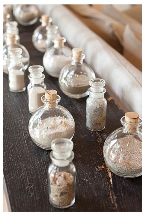 This is a sand collection. Little pretty bottles of sand from vacations at the beach, like a small memory of a happy day! Sand Collection Display, Beach Keepsakes, Pretty Bottles, Shell Display, Seashell Projects, Shells And Sand, Sand Collection, Tiny Jars, Travel Keepsakes