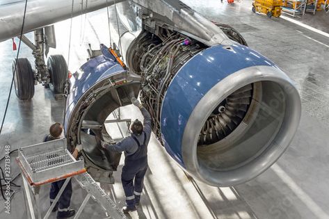 Stock Image: Technical specialists and aircraft technicians install the reverse engine after scheduled service. Concept maintenance of airplane. Airplane Boneyard, Plane Games, Propeller Plane, Cessna 172, Aircraft Parts, Aircraft Maintenance, Light Games, Royal Air Force, A Plane