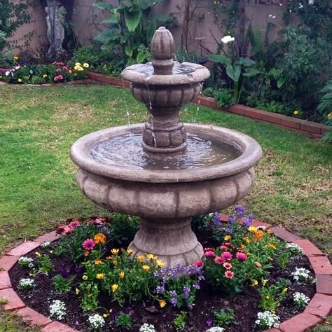 My new fountain. My husband knows exactly what I needed! Fountains For Small Gardens, Fountain In Garden, Fountain In Flower Bed, Fountains Planted With Flowers, Spanish Style Fountains, Ranch Fountain, Fountain Filled With Flowers, Outside Fountains, Front Yard Fountain