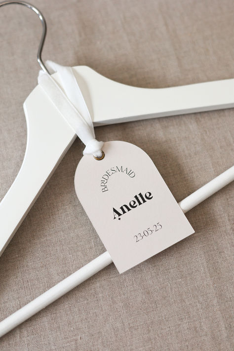 CUSTOM ARCHED HANGER TAGS FOR WEDDING DAY, PRINTED ARCH SHAPE NAME TAGS, SIMPLE & ELEGANT WEDDING PARTY, MODERN WEDDING HANGER TAGS, GIFT TAGS, ON THE DAY STATIONERY Personalise your or bridesmaid hangers with these simple wedding hanger tags giving a lovely finishing touch to your special day. Personalise it with names, date and bridal party role Diy Wedding Hangers Bridesmaid, Hanger Name Tags, Hanger Tags Wedding, Bridesmaid Hanger Tags, Wedding Hanger Tags, Wedding Hanger Ideas, Bridesmaids Gifts Day Of Wedding, Bridesmaid Wedding Day Gifts, Bridesmaid Hangers Diy