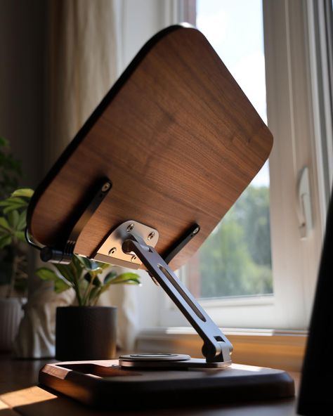 📖📚💻Upgrade your workspace with our 2-in-1 Adjustable Laptop Stand and Book Holder, crafted from luxurious black walnut wood. This premium, durable stand offers 360-degree adjustability for perfect viewing angles, blending functionality with elegance. Perfect for both laptops and books, it transforms your desk into a sophisticated, productive haven. 🎧 #WorkspaceGoals #LaptopStand #HomeOffice #BlackWalnut #DeskAccessories #ProductivityBoost #LuxuryDesign #TechGadgets #BookHolder #ErgonomicDesi... Laptop Holder Stand, Genius Inventions, Laptop Stand Wood, Laptop Stand For Desk, Adjustable Laptop Stand, Home Studio Setup, Laptop Tray, Book Holder, Black Walnut Wood