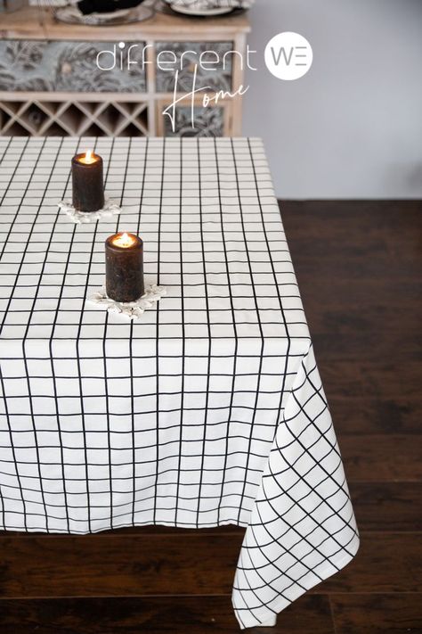 This Linen Plaid tablecloth is the perfect way to add modern style to your next picnic or backyard party. The cotton checkered tablecloth is made of a high-quality fabric blend for durability and comfort. It features a classic black-and-white pattern that will give your outdoor space a timeless look. The large size is perfect for any table and will make a great addition to your outdoor entertaining supplies. Enjoy many years of stylish entertaining with this Linen Plaid tablecloth. Black And White Table Cloth, Umpa Lumpa, Checkered Table Cloth, Checkered Table, Natural Linen Tablecloth, Black Tablecloth, Beachy Wedding, Candle Arrangements, Checkered Tablecloth