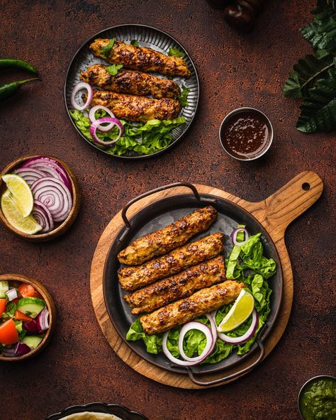 Experience the best kebab time of your life! Hand made and prepared on a charcoal flame grill, every piece is individually skewered and cooked to bring out its authentic flavour!! The best part, our Chicken Seekh Kebabs are fully cooked and pack a kick that’s sure to leave you coming back for more! #alsafafoods #halal #halalfood #iftar #iftarideas #ramadan #ramadan2023 #kebab #kabob #kebob #seekhkebab #seekhkebob #chickenkebab Chicken Kabab Food Photography, Grilled Food Photography, Kebab Photography Food Styling, Kebab Platter Photography, Seekh Kebab Photography, Kebabs Photography, Kebab Food Photography, Iranian Kebab, Kebab Photography