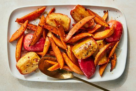 Simple enough for weeknights but special enough for holidays, this mix of roasted root vegetables and fruits showcases all the sweetness fall produce has to offer Because each ingredient roasts differently, you’ll also get various textures, from jammy apples to crisp-tender carrots Honey accentuates the sweetness, but there’s plenty of room for personal flare Sweet Potato And Apples, Apples And Sweet Potatoes, Sweet Potatoes And Apples, Potatoes And Apples, Warm Kale Salad, Nyt Recipes, Autumn Meals, Jelly Salad, Food Sides