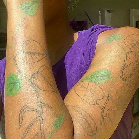 43 Color Tattoos On Dark Skin That Will Inspire Your Next Appointment — See Photos | Allure Botanical Tattoo Dark Skin, Green Tattoo On Brown Skin, Healed Color Tattoos On Dark Skin, Green Tattoo On Dark Skin, Blue Tattoo On Brown Skin, Colored Tattoos On Brown Skin, Tattoos On Brown Skin, Color Tattoos On Dark Skin, Green Tattoo Ink