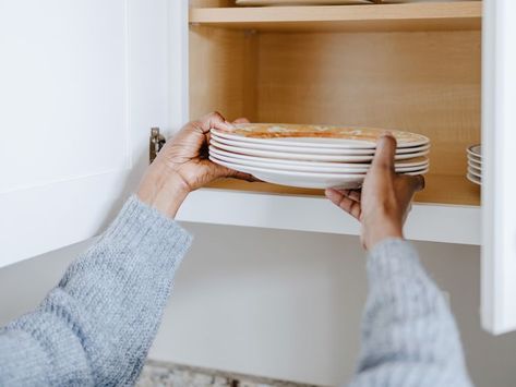 The Unexpected Reason Why You Shouldn’t Store Your Plates on Cabinet Shelves Kitchen Cabinet Shelves, Kitchen And Pantry, Cabinet Shelves, Kitchen Clutter, Plate Storage, Large Plates, Storage Hacks, China Sets, Cabinets Organization