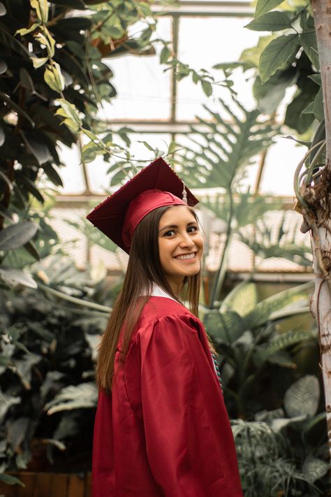 Senior photos taken on Campus' Greenhouse! Green House Senior Pictures, Green House Senior Photos, Botanical Garden Graduation Photos, Botanical Gardens Senior Pictures, Greenhouse Portraits, Senior Pics Botanical Gardens, Birmingham Botanical Gardens, High School Graduation Pictures, Cap And Gown Photos