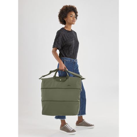 Travel bag expandable Le Pliage Green Black (L1911919001) | Longchamp AU Waterproof Bag Beach, Longchamp Travel Bag, Longchamp Le Pliage Green, Waterproof Beach Bag, Green Travel, Dog Bag, Recycled Canvas, Waterproof Bags, Toiletry Bag Travel