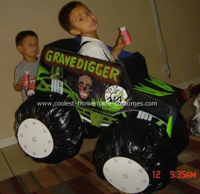 GraveDigger Monster Truck Costume: In 2007, my nephew wanted to be Gravedigger more than anything for Halloween so I offered to try and make a gravedigger monster truck costume for him. Gravedigger Costume, Birthday Party Ideas Halloween, Gravedigger Monster Truck, Monster Truck Costume, Monster Truck Birthday Party Ideas, Cardboard Cars, Truck Costume, Truck Birthday Party Ideas, Party Ideas Halloween