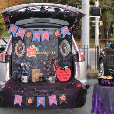 When it comes to trunk-or-treating, I'll admit it, my car is the LAME-O-trunk. I typically fling a bag of assorted candy (if I'm lucky) into the back of my car Trunk Or Treat For Sedans, Disney Descendants Trunk Or Treat, Decendants Trunk Or Treat, Descendants Trunk Or Treat Ideas For Cars, Trunk Or Treat Event Planning, Descendants Trunk Or Treat Ideas, Christmas Theme Trunk Or Treat, Villain Trunk Or Treat, Sleeping Beauty Trunk Or Treat