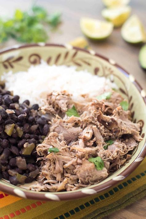 Easy Slow Cooker Cuban Pork with Black Beans and Rice is a satisfying, flavorful meal you can make any night of the week. The pork roast cooks low and slow throughout the day and the black beans and rice can be made just before you are ready to serve. #cubanpork #pork #slowcooker #crockpot #cubanrecipes Cuban Black Beans And Rice, Cuban Rice And Beans, Pork Slow Cooker, Cuban Rice, Slow Cooker Cuban Pork, Red Beans Recipe, Cuban Pork, Cuban Black Beans, Slow Cooker Pork Tenderloin