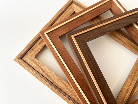 Unique SOLID HARDWOOD photo frame in our "Wood Wedge" style molding. This modern solid finish frame style features a natural wood strip down  the center for a truly uncommon look. Frame profile width is 1.5 inches. Choose your small frame size - 2x2 up to 24x36 inches.* Pick your size and SOLID NATURAL finish color from our selections in the drop down menu. The wedge portion will be NATURAL POPLAR unless noted in the personalization bar. Frames are built to order. Please allow 3 weeks for frames Wood Art Frames, Small Projects Ideas, Picture Frame Wood, Unique Picture Frames, Lazer Cut, Rustic Wood Frame, Wooden Photo Frames, Wooden Picture Frames, Wedges Style