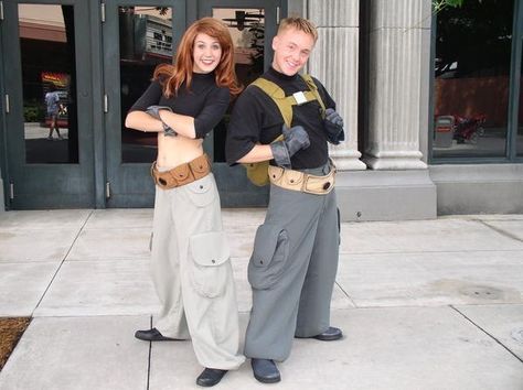 Probably the cutest couples Halloween costume. Kim Possible and Ron Stoppable. I love this.... Kim Possible And Ron Stoppable, Kim Possible Costume, Adventurers Club, Kim Possible And Ron, Ron Stoppable, Kim Possible Cosplay, Giant Spiders, Kim And Ron, White Tigers