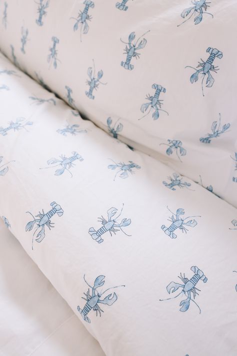 L.L. Bean x Sara Fitz lobster bedding collection Ll Bean Bedding, Costal Grandma Bedding, Blue And White Bedding Aesthetic, Coastal Cowgirl Aesthetic Decor, East Coast Home Decor, Costal Grandma Room Decor, East Coast Room Decor, Coastal Bed Sheets, Beachy Bed Sheets