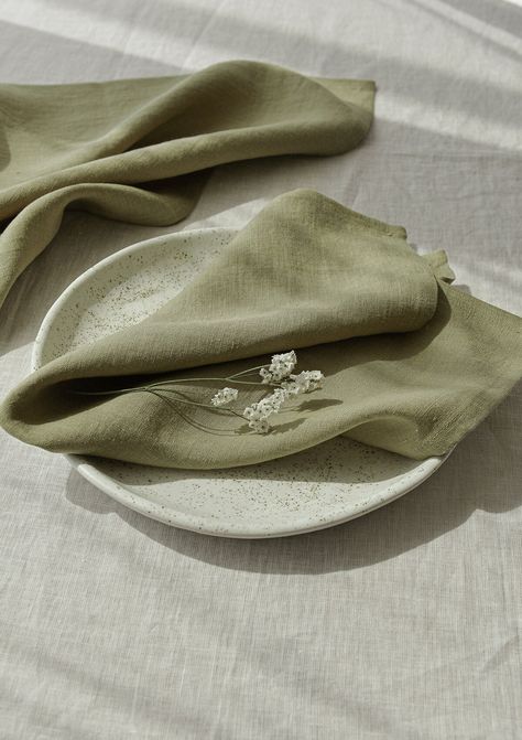 "Add a touch of understated elegance to your table decor with this moss green linen napkin set. Handcrafted of premium quality European flax, our cloth napkins will get softer and better over time. Finished with a classic mitered corner, these table linens are destined to become an elevated staple of your home. Mix and match or coordinate linen tablecloths to create a complete tablescape. DETAILS - Sold in sets of 4, 6, or 10 napkins - Napkin size: 18x18\" (46x46 cm) - Handmade from premium qual Green Napkins, Green Table, Handmade Table, Home Decor Online, European Linens, Table Linen, Table Napkins, Wedding Napkins, Understated Elegance